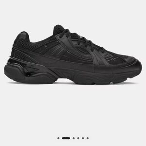 Under Armour UA Sola unisex shoes in black.